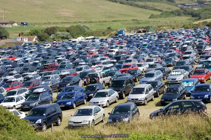 : Devon, UK - Crowded car park on hot summer day : Devon, UK - Crowded car park on hot summer day