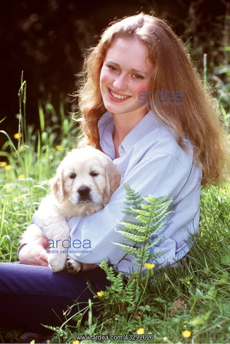  : DOG - PUPPY - GIRL CUDDLING