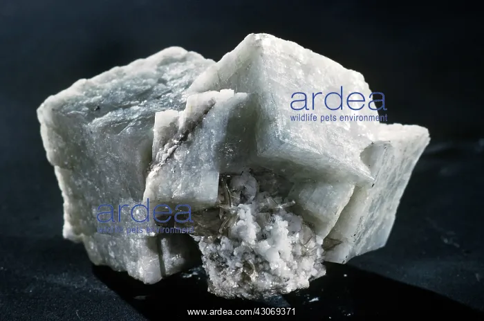 : Dolomite, calcium magnesium carbonate, is a common mineral that occurs : Dolomite, calcium magnesium carbonate, is a common mineral that occurs