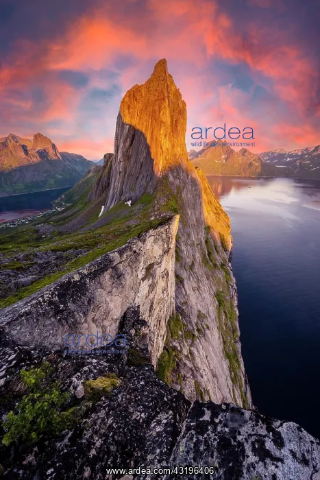 : Dramatic clouds, evening mood, steep mountain Segla : Dramatic clouds, evening mood, steep mountain Segla