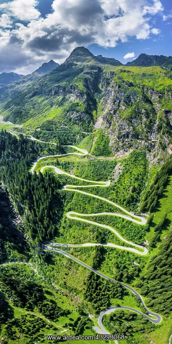 : Drone shot, winding road, Silvretta high alpine : Drone shot, winding road, Silvretta high alpine