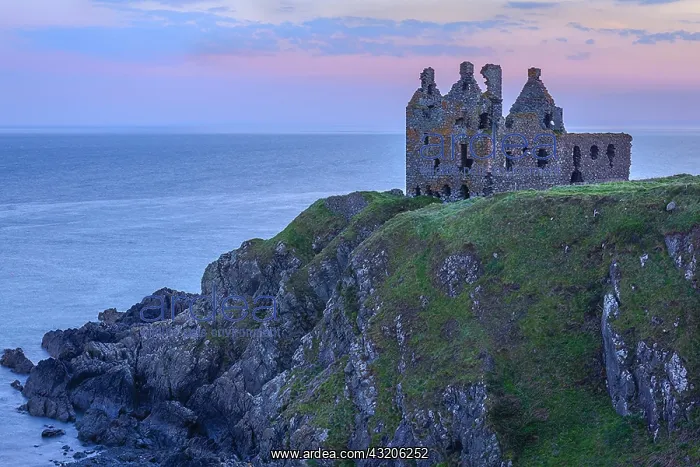 : Dunskey Castle - ancient tower house built on top : Dunskey Castle - ancient tower house built on top