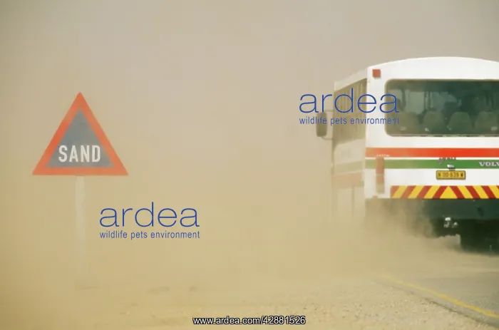 : DUST / SAND STORM - 'SandI road sign and bus : DUST / SAND STORM - 'SandI road sign and bus