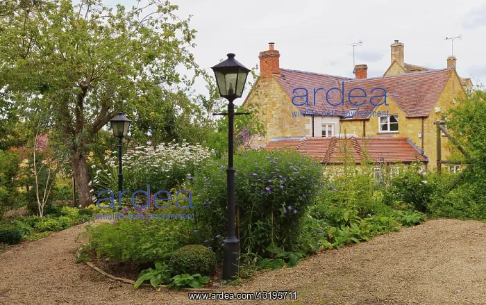 : Entrance to classic homestead decorated with flowers : Entrance to classic homestead decorated with flowers