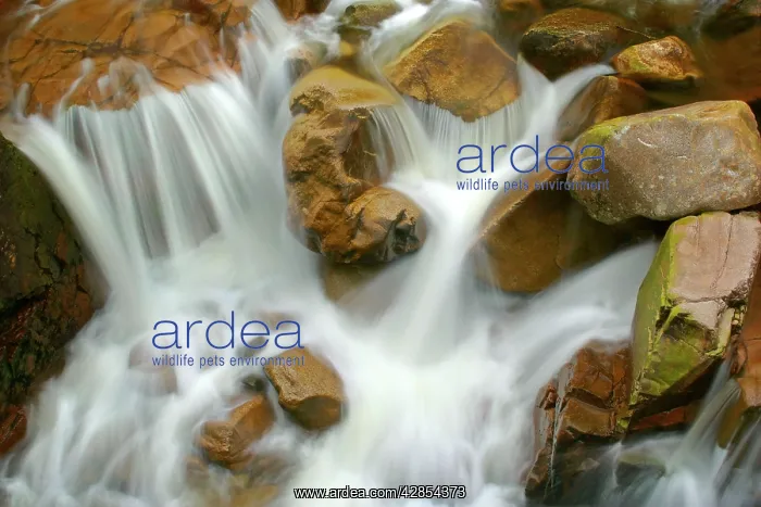 : Etive river cascades - water flowing over red rocks : Etive river cascades - water flowing over red rocks