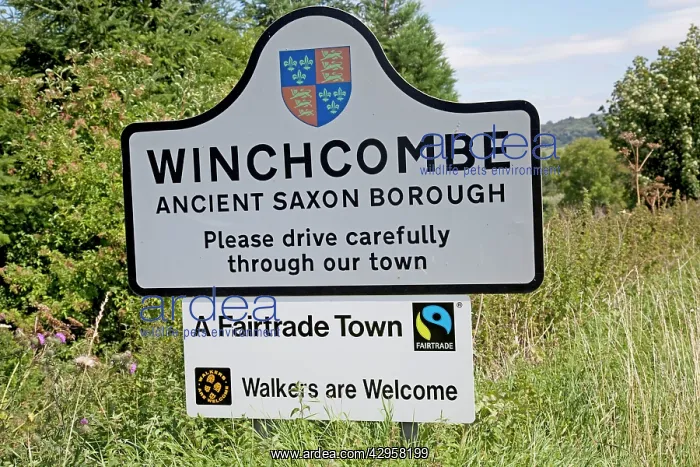 : Fairtrade town notice on roadside approaching Winchcombe : Fairtrade town notice on roadside approaching Winchcombe