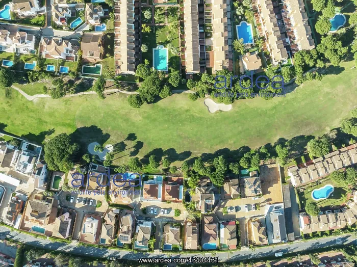 : Fairway framed by housing estates at the Islantilla : Fairway framed by housing estates at the Islantilla