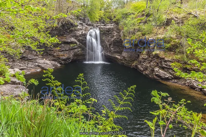 : Falls of Falloch - Falloch river cascades down a : Falls of Falloch - Falloch river cascades down a