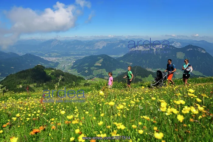 : Family hiking on the summit panorama trail of the : Family hiking on the summit panorama trail of the