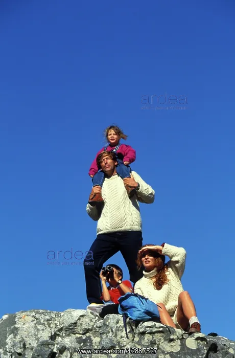  : Family - parents with two children, hiking