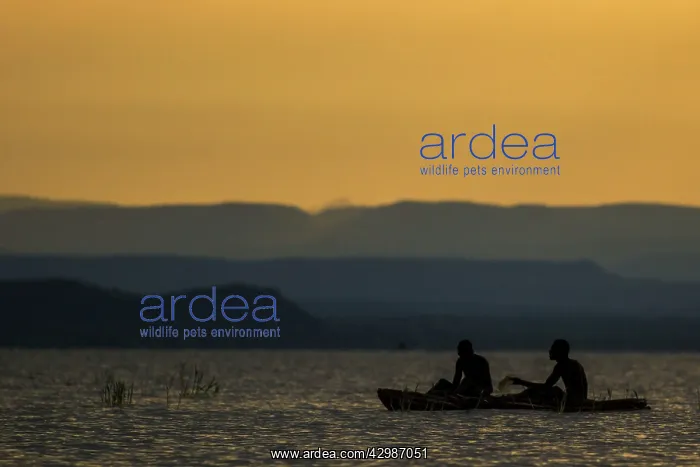 : Fishermen - silhouette at sunset. Lake Baringo, Kenya