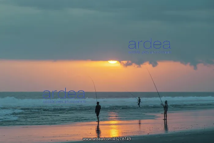 : Fishermen standing on the beach, Kerambitan, Bali : Fishermen standing on the beach, Kerambitan, Bali