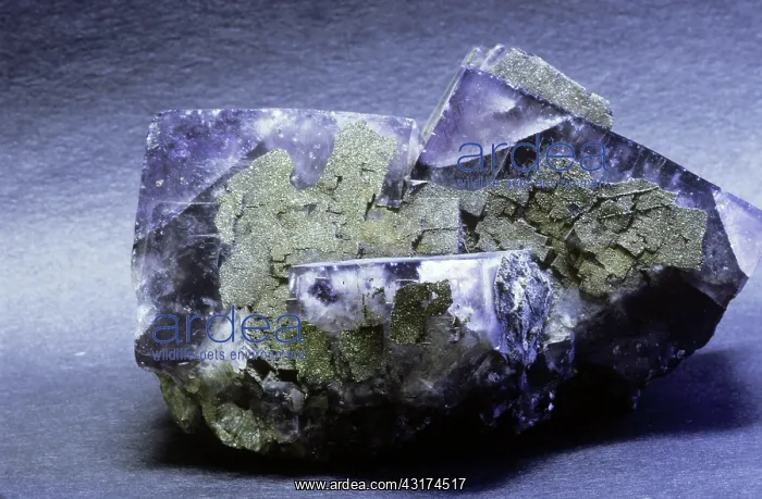 : Fluorite, a mineral composed of calcium fluoride (CaF2) : Fluorite, a mineral composed of calcium fluoride (CaF2)
