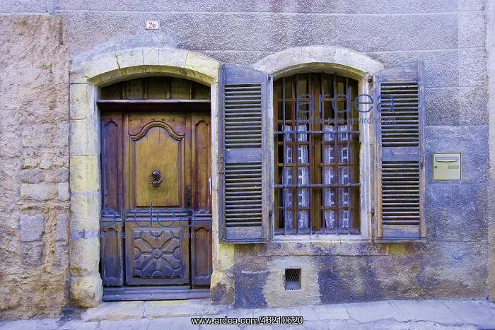  : France, Arles. Stone doorway with wooden