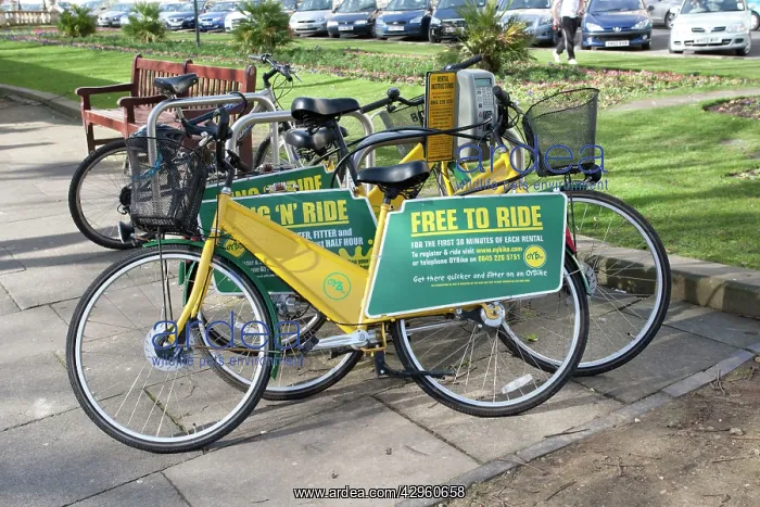  : Free to Ride OYB yellow bike rental docking station