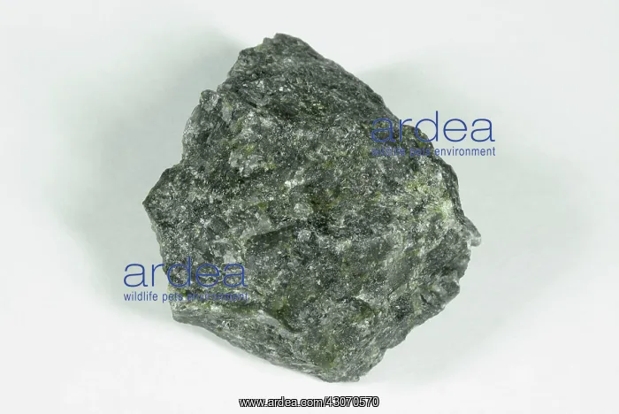 : Gabbro. Hand sample of Gabbro, a crystalline intrusive igneous rock consisting : Gabbro. Hand sample of Gabbro, a crystalline intrusive igneous rock consisting