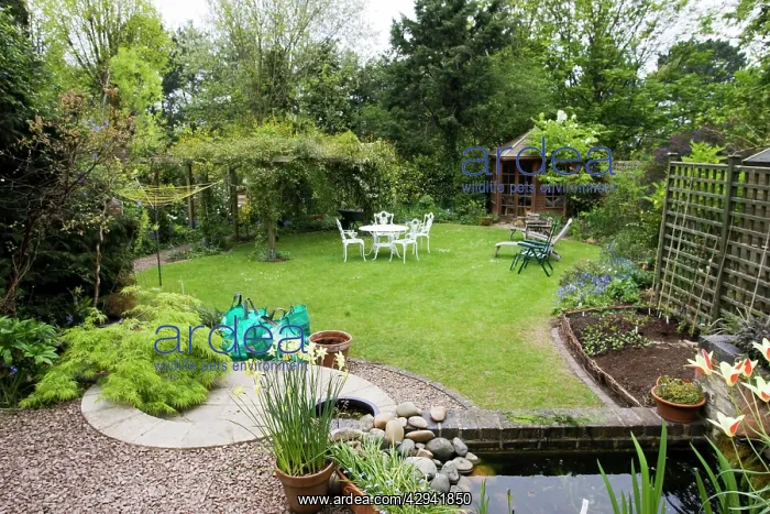 : Garden - attractive suburban back garden with pond : Garden - attractive suburban back garden with pond