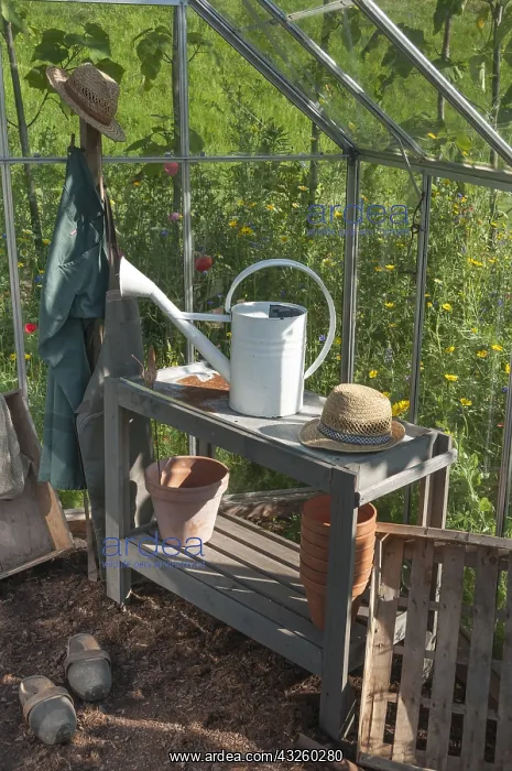 : Gardener equipment in a greenhouse, summer, Moselle : Gardener equipment in a greenhouse, summer, Moselle