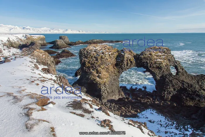 : Gatklettur Arch Rock cliff with circular arch : Gatklettur Arch Rock cliff with circular arch