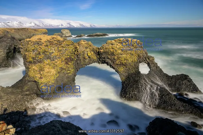 : Gatklettur at sunrise, rock arch in the sea, Arnarstapi : Gatklettur at sunrise, rock arch in the sea, Arnarstapi