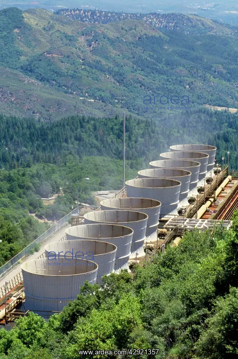 : Geothermal Energy - steam leaves cooling towers : Geothermal Energy - steam leaves cooling towers