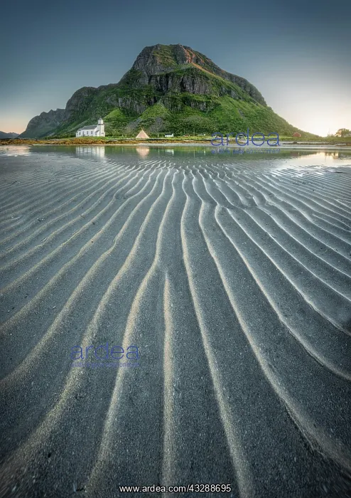  : Gimsoy church reflected in the sea at low tide