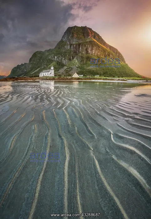 : Gimsoy church in front of a sandy beach with ribbed : Gimsoy church in front of a sandy beach with ribbed