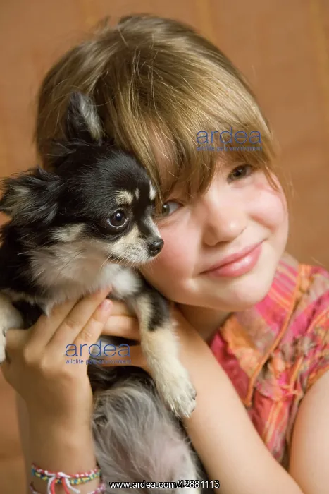  : Girl - cuddling puppy