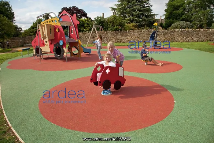 : Girl playing with safety rubber activity matting : Girl playing with safety rubber activity matting