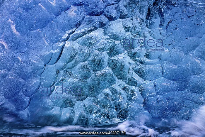 : Glacial ice in the surf along the Diamond Beach : Glacial ice in the surf along the Diamond Beach