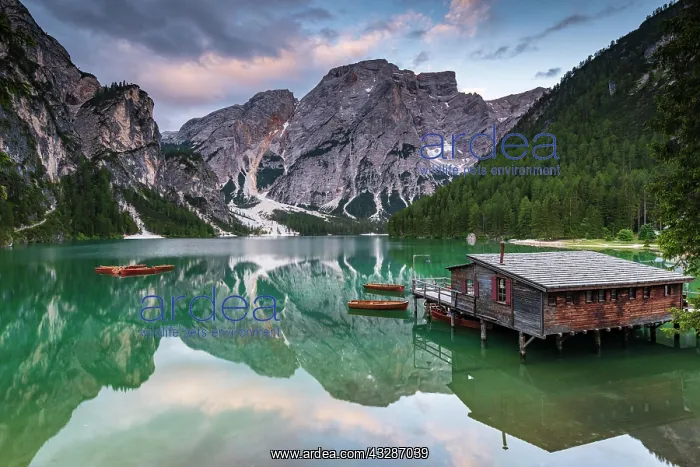 : Green mountain lake with boats and boathouse, Seekogel : Green mountain lake with boats and boathouse, Seekogel