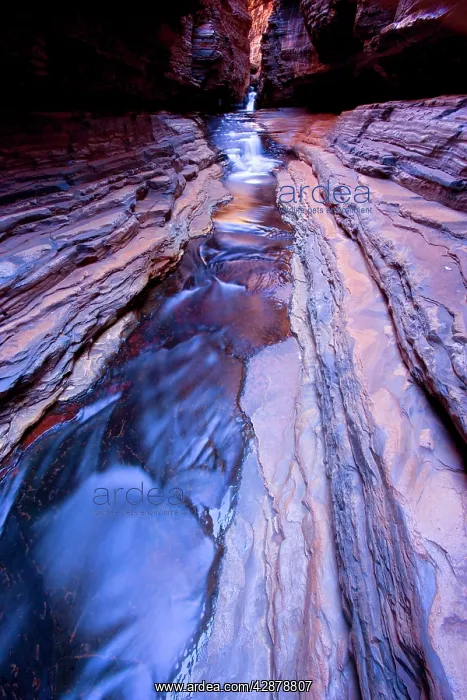 : Hancock Gorge - a stream is flowing down Hancock : Hancock Gorge - a stream is flowing down Hancock