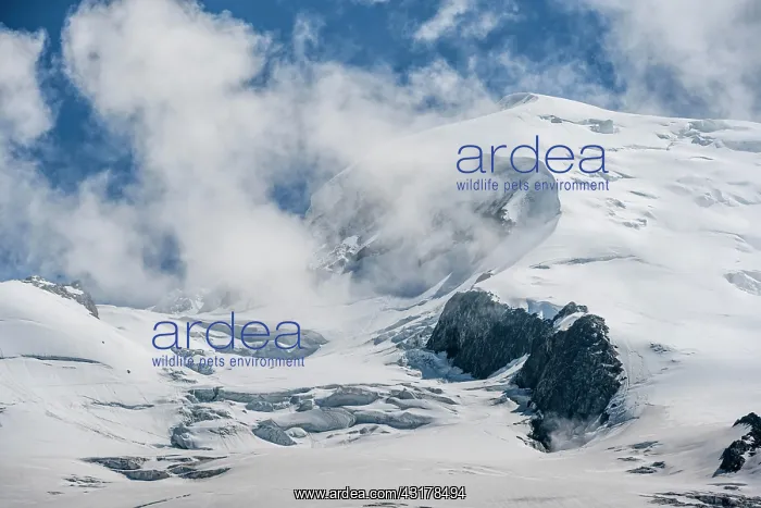 : High alpine mountain landscape, clouds on the summit : High alpine mountain landscape, clouds on the summit