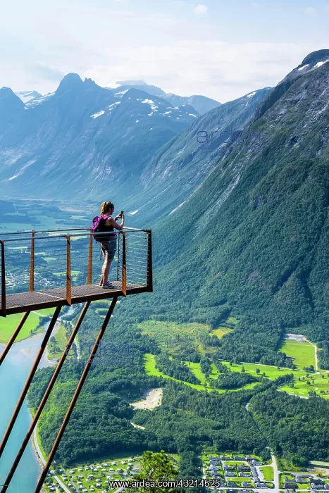  : Hiker standing on viewing platform Rampestreken