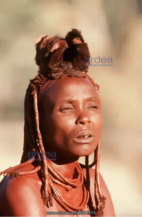 : HIMBA WOMAN - leather headress used as symbol of : HIMBA WOMAN - leather headress used as symbol of
