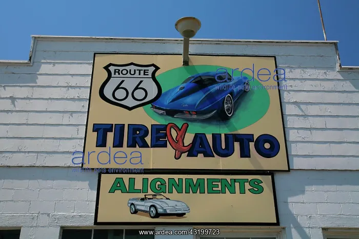 : Historic signs at a car garage next to route 66 : Historic signs at a car garage next to route 66