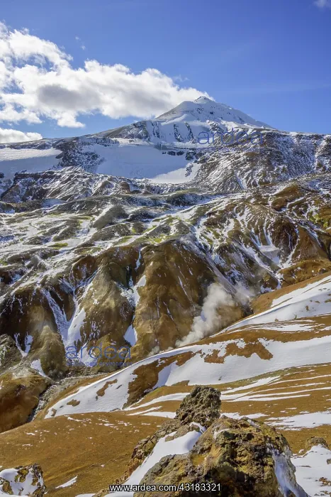 : Hot spring area Hveradalir and behind it Mount M~nir : Hot spring area Hveradalir and behind it Mount M~nir