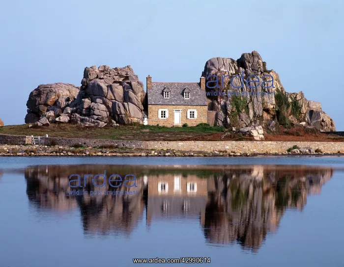 : A house built between the rocks at Plougrescant : A house built between the rocks at Plougrescant