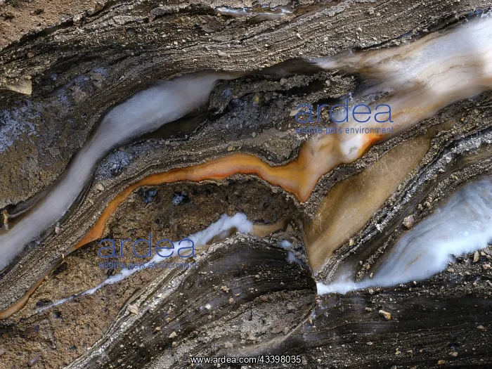 : Ice with moraine material. Ice cave south of Longyearbyen : Ice with moraine material. Ice cave south of Longyearbyen