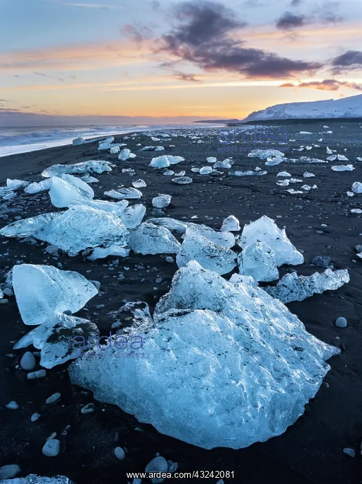 : Iceberg on black volcanic beach. North Atlantic : Iceberg on black volcanic beach. North Atlantic
