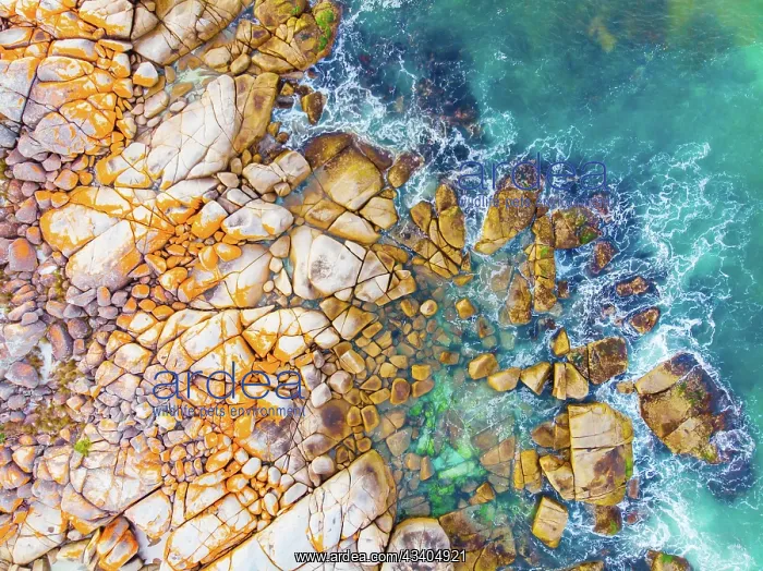  : The iconic lichen covered rocks and turqoise ocean