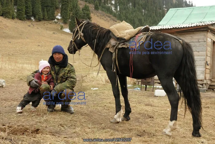 : Indigeneous People - man with young child : Indigeneous People - man with young child