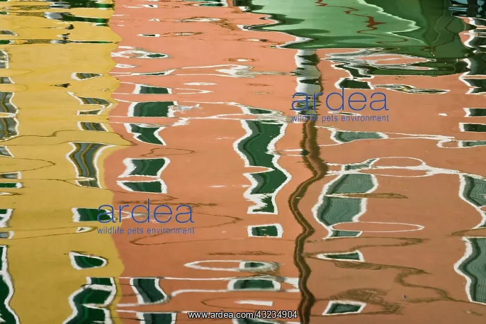 : Italy, Burano. Colorful houses reflected : Italy, Burano. Colorful houses reflected