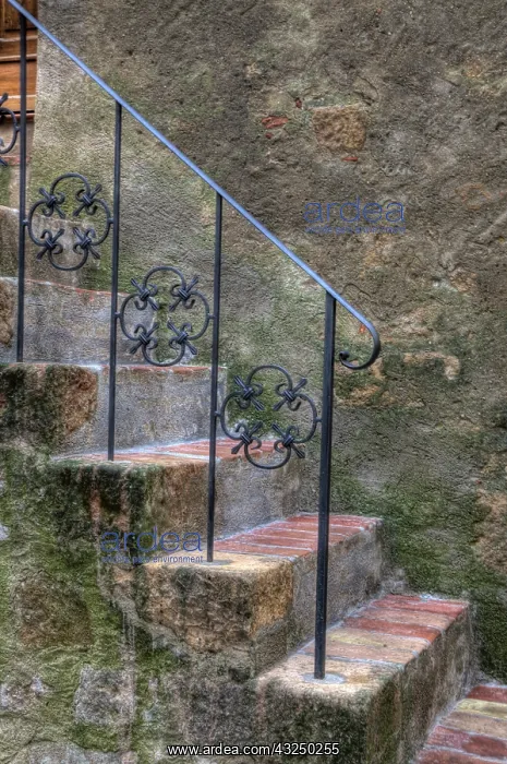 : Italy, Tuscany, Pienza. Steps with wrought iron : Italy, Tuscany, Pienza. Steps with wrought iron