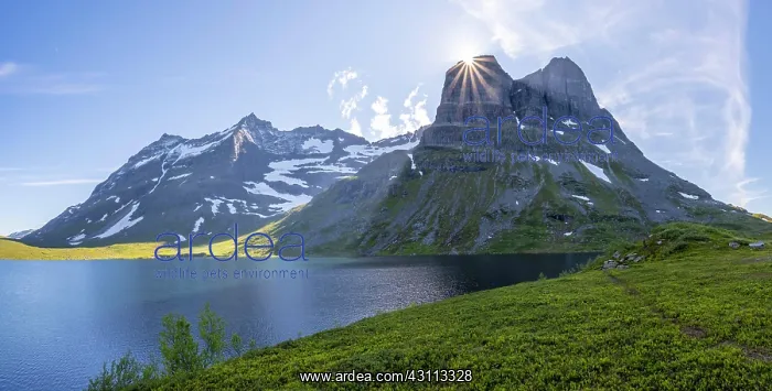 : Lake Storvatnet, sun disappears behind mountain : Lake Storvatnet, sun disappears behind mountain