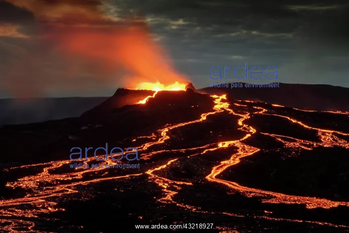 : Lava spurting out of crater and reddish illuminated : Lava spurting out of crater and reddish illuminated