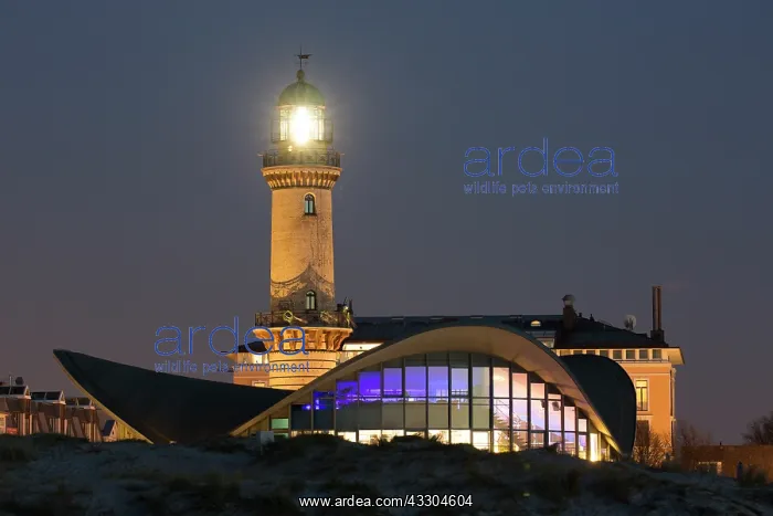 : Lighthouse and the landmark Teepott at night in : Lighthouse and the landmark Teepott at night in