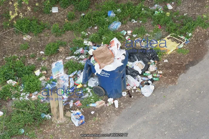 : Litter. Trash, litter, at a boat ramp on the Congaree River : Litter. Trash, litter, at a boat ramp on the Congaree River