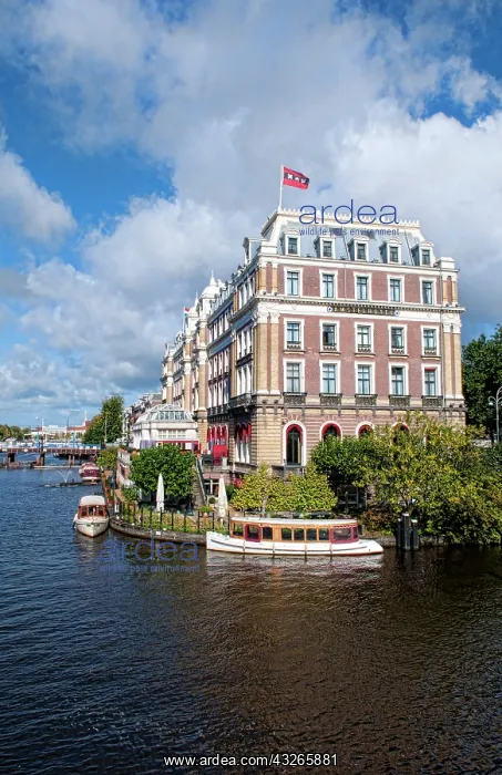 : Local working boats on the canals in Amsterdam : Local working boats on the canals in Amsterdam