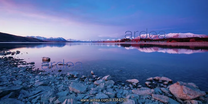 : Majestic Lake Tekapo at sunset on a cool spring e : Majestic Lake Tekapo at sunset on a cool spring e